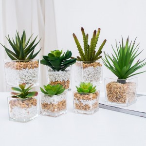 potted artificial succulent in glass ware