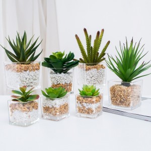 potted artificial succulent in glass ware